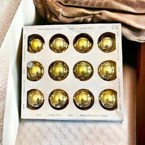 Set of 12 Vintage Rauch ornaments in gold